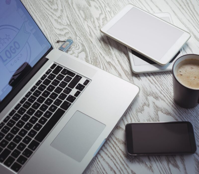 various-technologies-with-coffee-cup-on-table-in-o-2025-04-05-09-25-02-utc